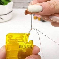 AUTOMATIC NEEDLE THREADER 